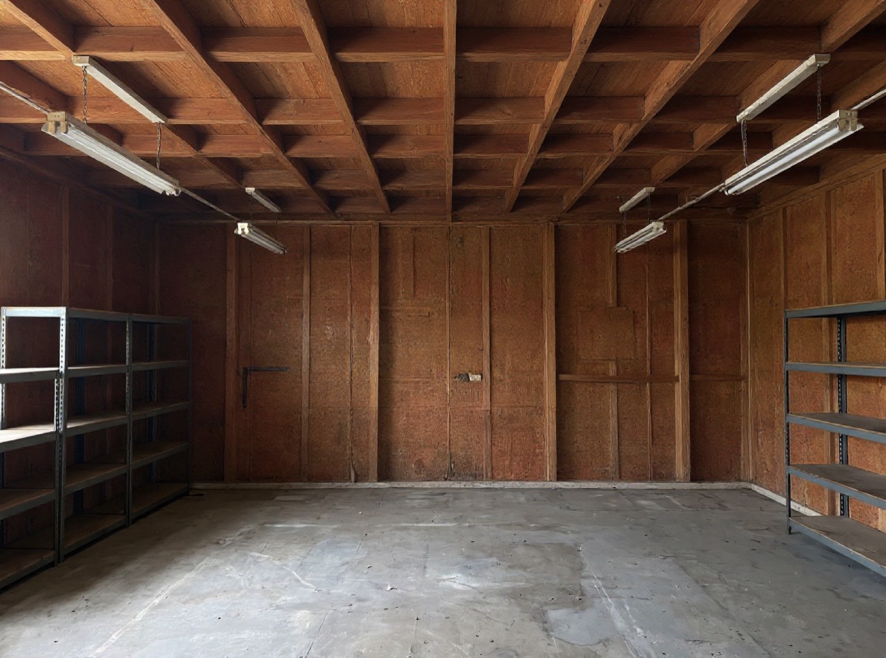 After: the same interior stripped back to bare frame, cleared and swept